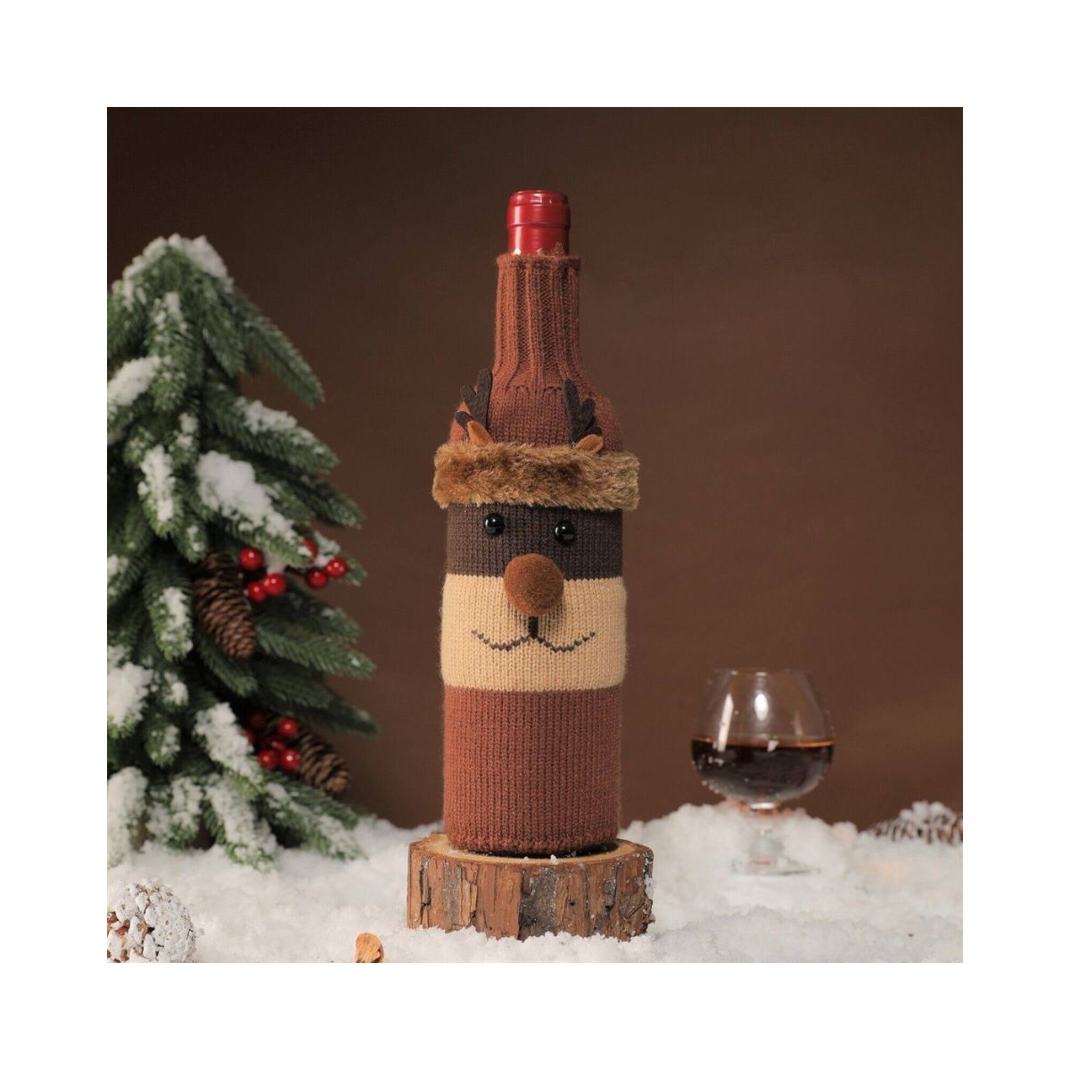 Juego de 3 fundas tejidas para botellas de vino navideñas.