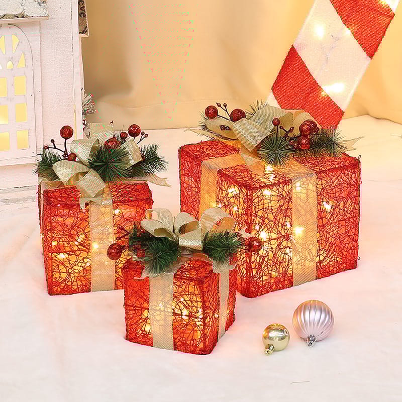 Adornos de 3 cajas con luces navideñas.